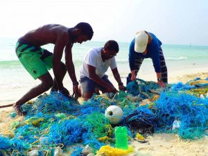 Ghost net dismantling on the beach Ha.Kelaa Maldives