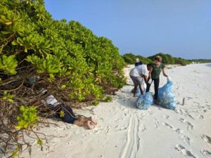 Beach cleanup at Kelaa Island Maldives