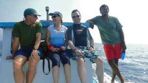 ORP's expedition volunteers with Shameel on the boat