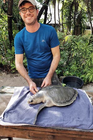 Visiting Vet Franceso and turtle patient Arti