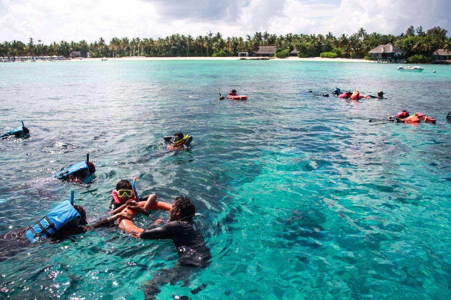 Marine Education Programme, Immaduddin School students snorkeling with wild turtles at One & Only Reethi Rah Maldives