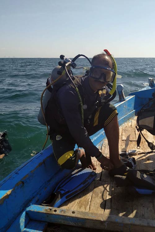 Asif geared up for his first ever dive