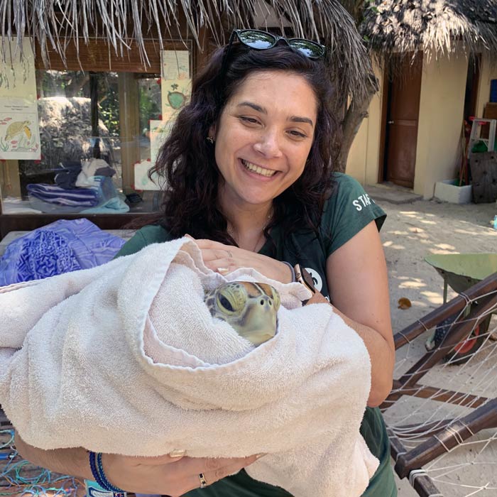 Dr Claire Petros with one of the turtle patients at the ORP Marine Turtle Rescue Centre