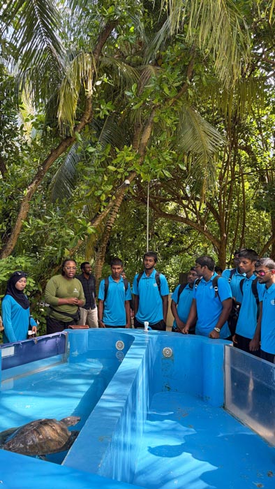 Hithaadhoo school visit on a tour of the Rescue Centre with Dr Michelle. Image.