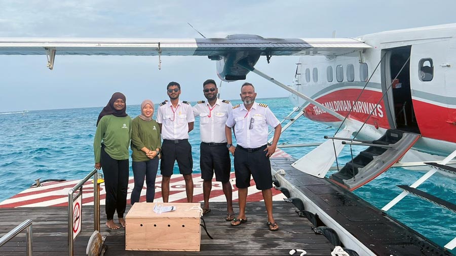 Rescue Centre intern Aini, Dr Naul, ant the TMA crew that brought Fida back to the Rescue Centre at the seaplane jetty at Coco Palm Dhuni Kolhu. Image.